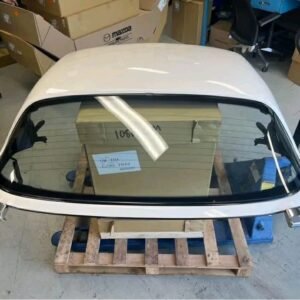 OEM white Miata hardtop.