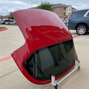 Red Miata hardtop.