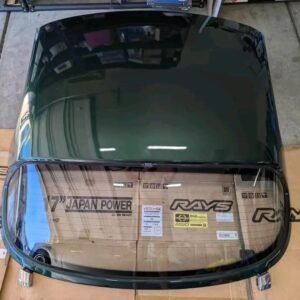 Used Mica green Miata hardtop.